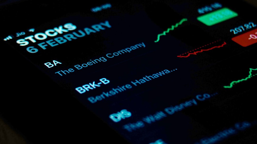 Smartphone displaying stock market app with company information.